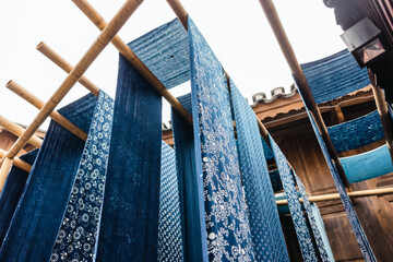 drying traditional dyed cloth by hanging outdoor