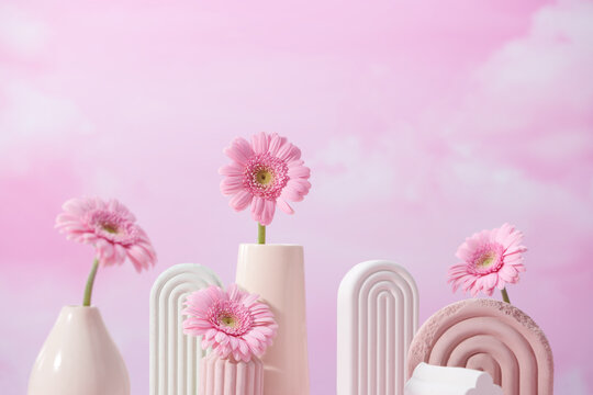 Beautiful pink gerbera flower in vase in home interior decor