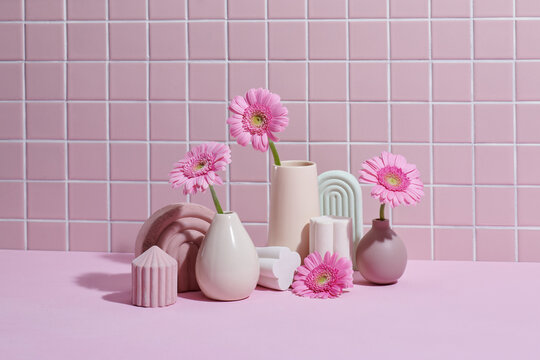 Home interior with easter decor. Gerberas in a vase, spring flowers