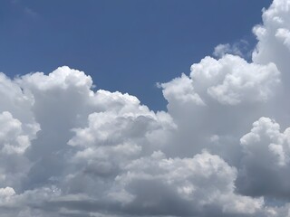  Sky filled with fluffy white clouds on a bright summer day