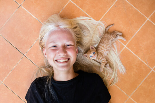 Teen girl and kitten