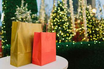 Paper bags with Christmas presents at a Christmas market