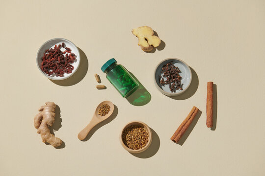 Concept of herbal medicine pills on white background