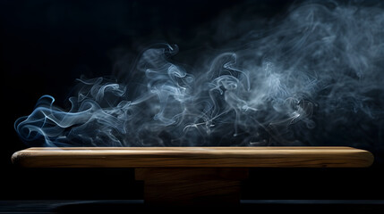 Empty wooden table with smoke rising, black background Free space for displaying products