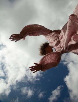 Girl is dacing in the sky