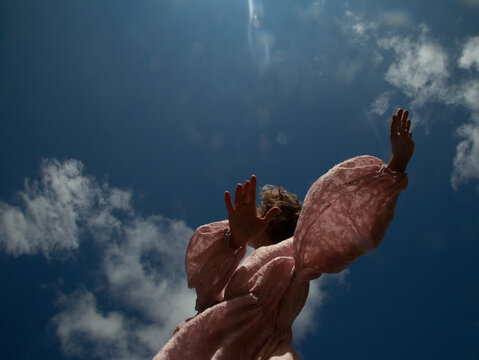 Girl is dacing in the sky