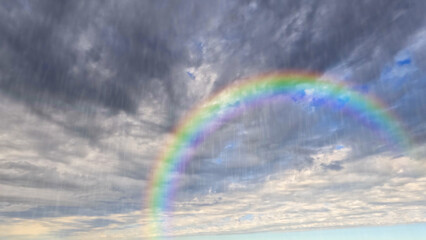 nice rainbow after the rainfall on clouds in the sky - photo of nature