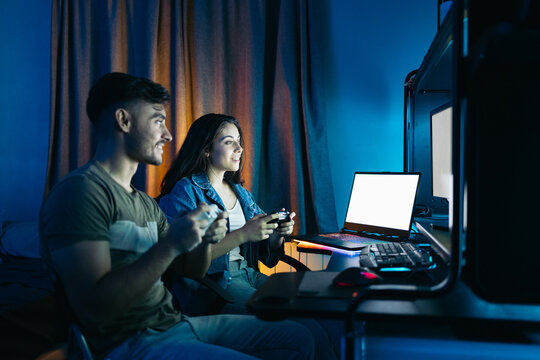 Couple having fun playing video games