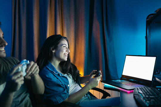 Couple having fun playing video games