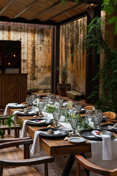 A wooden table before a banquet