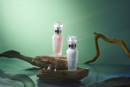 front view of cosmetic cream bottles on color background