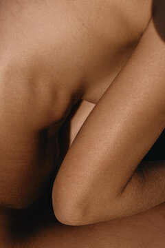 Close up photo of the skin texture of woman's  body