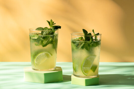 Classic rum mojito cocktail on colorful background