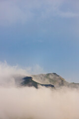 Passing clouds over a landscape in Turkey with mountain peaks in the background. Landscape of mountain range and mountains. Dedegol. Turkey.