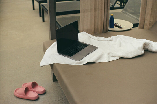  laptop on the pool lounger 35mm Film photo