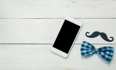 Top View Happy Father Day White Mobile Phone Rustic Wooden Background Sign Father Is Mustache Vintage Bow Tie - Powered by Adobe