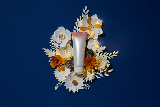 Plastic tube product ads with light purple paper flowers decoration