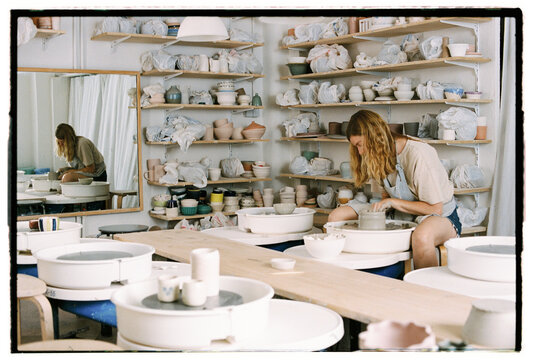 Ceramist working at pottery studio