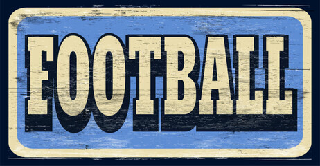 Aged and worn football sign on wood