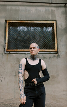 portrait of gay man wearing total black , soft light