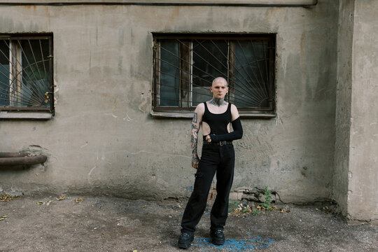 portrait of gay man wearing total black , soft light