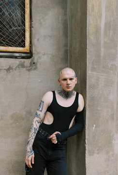 portrait of gay man wearing total black , soft light