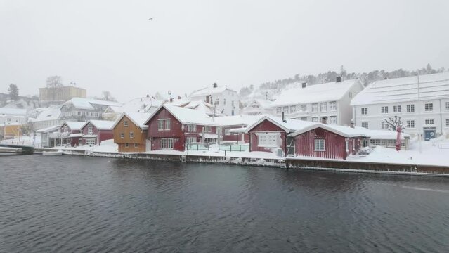 Waterfront Village During Winterly Day In Kragero, Norway. Aerial Wide Shot