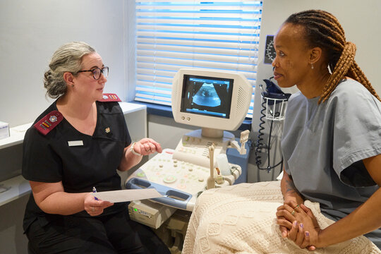Nurse and Patient discuss women's healthcare