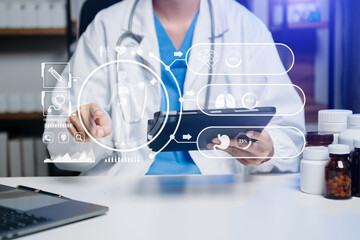 medical technology concept,smart doctor hand working with modern laptop computer with his team...