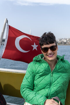Tourist on a boat tour in Istanbul.