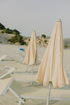 Beach with sun beds and umbrellas