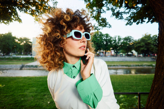Portrait of a trendy woman talking on the phone