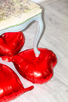 Conceptual still life on the theme of love with a chair on the heart.
