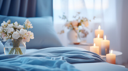 Romantic bedroom with candles and light, pastel blue colors