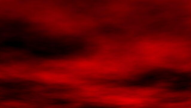 Animation of simulation of red clouds moving in black sky with low angle perspective