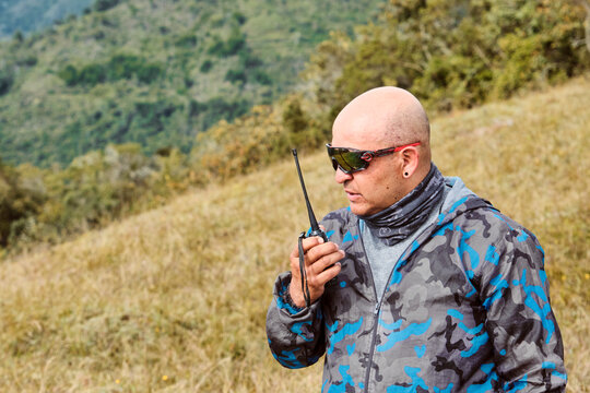 Mature man talking over the radio intercom