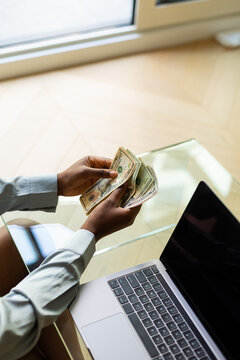 Woman Counting Money