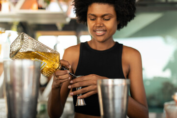 Bartender pouring liquor