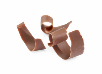 Many delicious chocolate shavings isolated on white