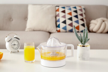 Freshly squeezed orange juice on the table