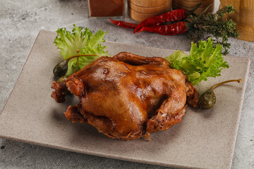 Baked small chicken with spices