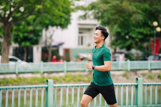 Man in sportswear running in a park