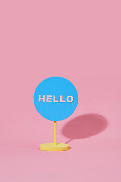 Signboard with text hello on a Pink background