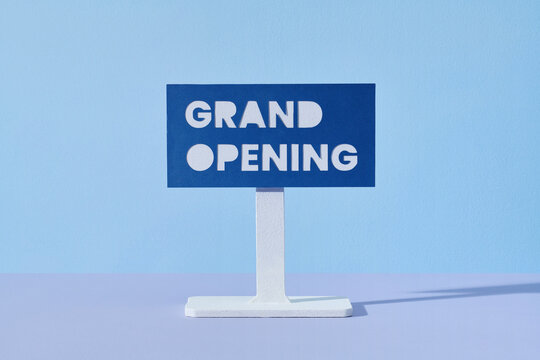 Grand Opening sign in a conceptual image