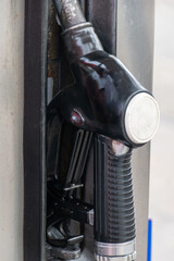 Part of a fuel dispenser, close-up of the fuel gun