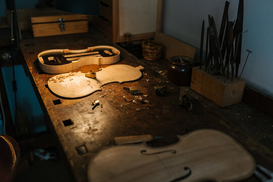 Wooden violin in process of creating