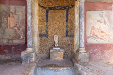 Statue and frescoes at ancient House of Octavius Quartio (Casa di Ottavio Quartione), Pompeii,...
