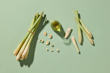A glass jar containing essential oil extracted from lemongrass