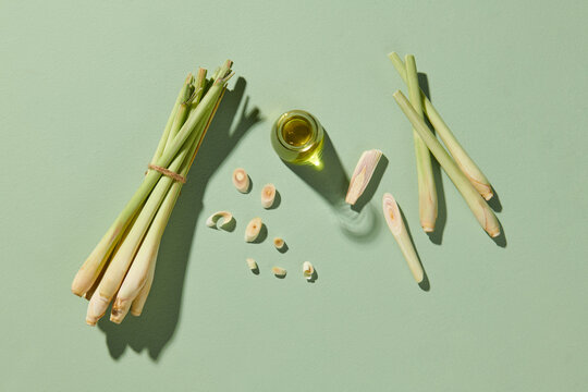 A glass jar containing essential oil extracted from lemongrass