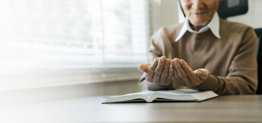 Grandfather sat and prayed to God on the window sill. Christian approaches to solitary worship...